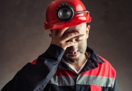 Portrait of tired coal miner